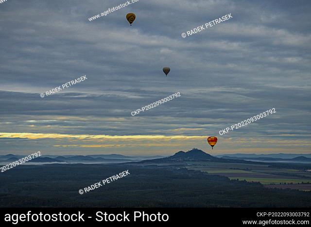 Hot air balloons fly over Bezdez castle within meeting of pilots and owners of hot air balloons, on September 30, 2022, near Bela pod Bezdezem, Czech Republic