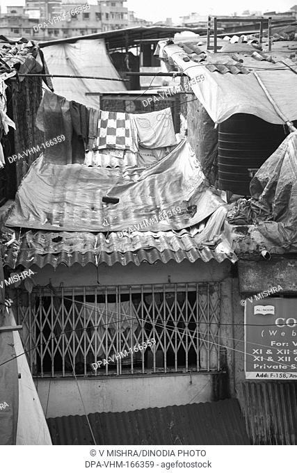 Slum Behram Naupada at Anant Kanekar Marg ; Bandra ; Bombay Mumbai ; Maharashtra ; India 9-September-2009