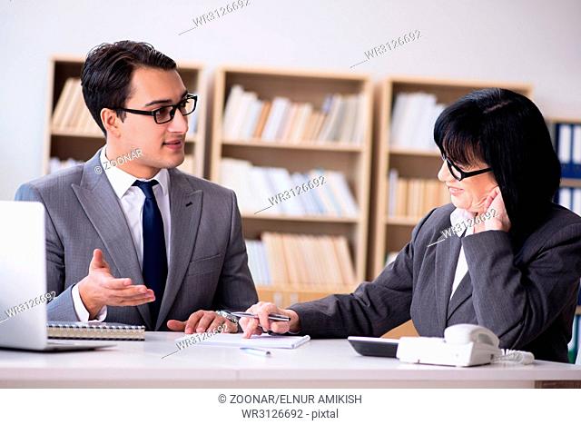 Business couple having discussion in the office