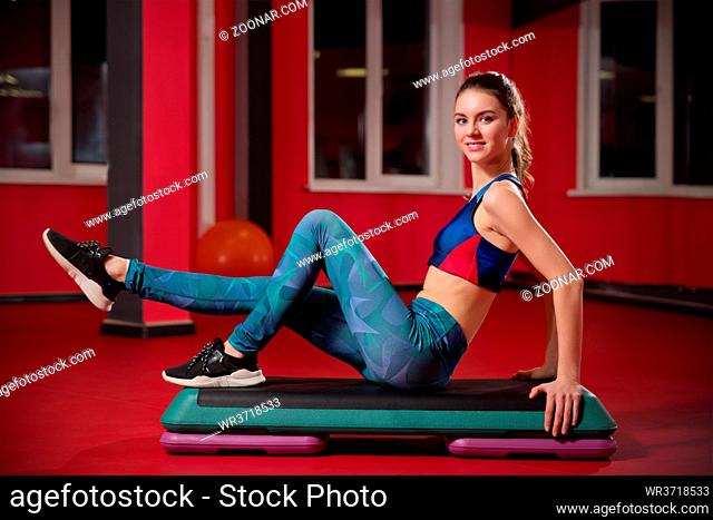 Young woman in fitness club
