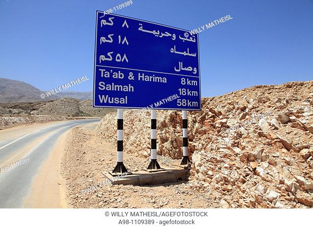 roadside direction signposts to Salmah Plateau and Wusat , Eastern Hajar Mountains, Sultanate of Oman, Asia