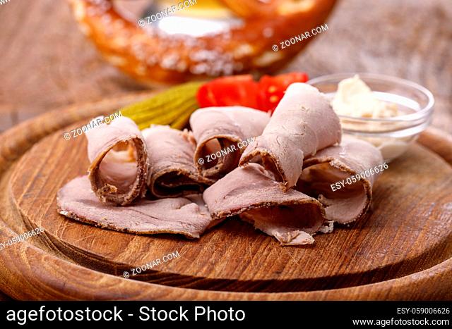 bavarian sliced cold pork on wood