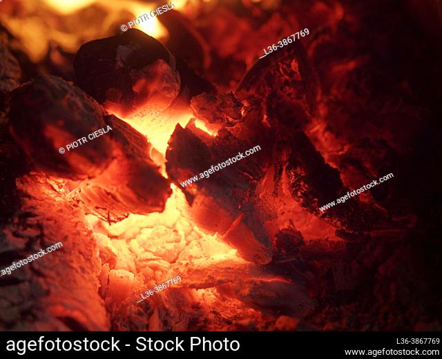 Poland. Fire place in a stove