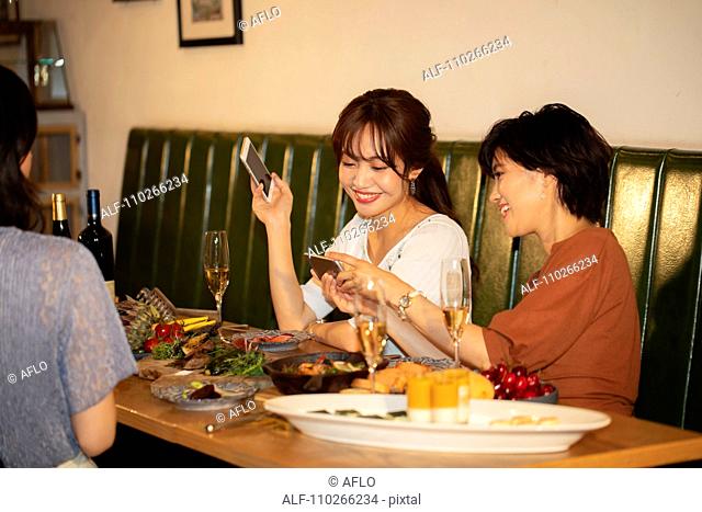 Japanese women happily dining together