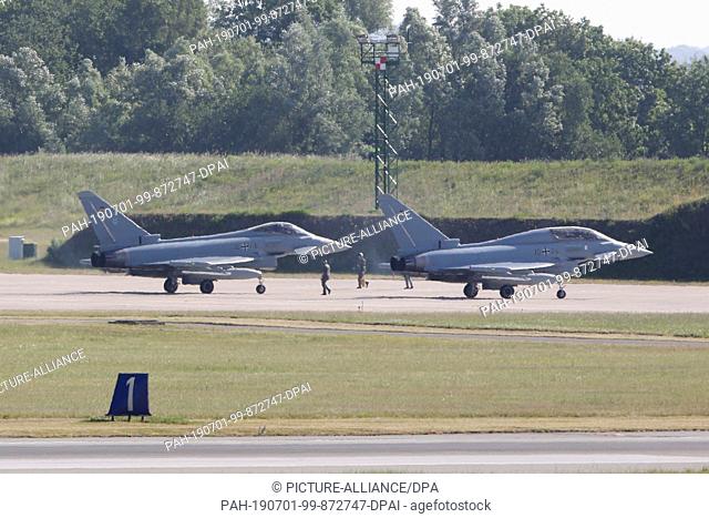 01 July 2019, Mecklenburg-Western Pomerania, Laage: Two Eurofighters are in Laage near Rostock before a training flight at the airport
