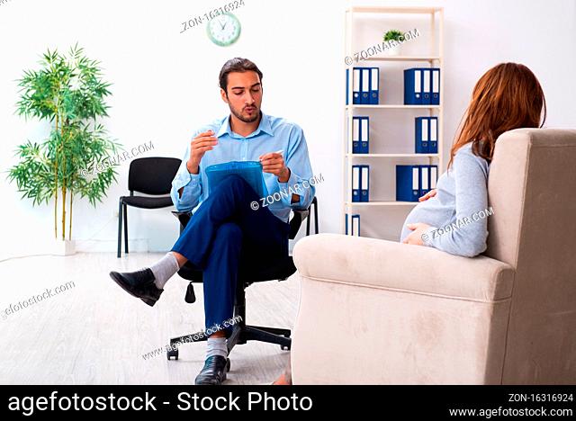 Pregnant woman visiting young psychologist