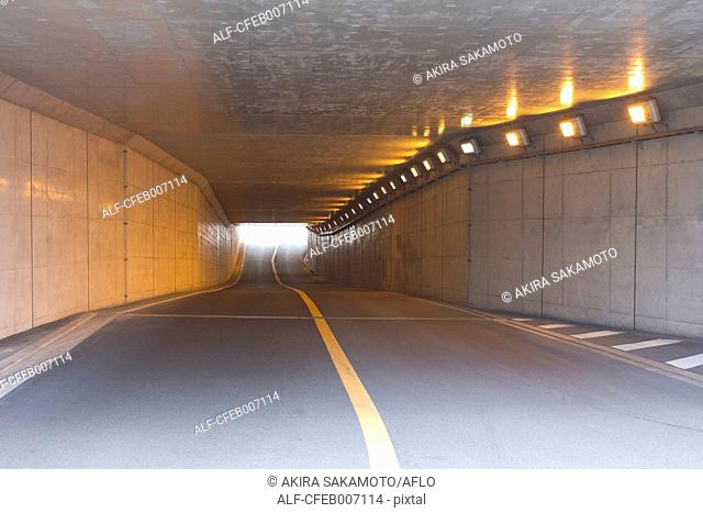 Lighted tunnel under the highway