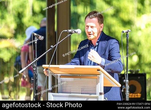 24 June 2023, Saxony, Bad Muskau: Michael Kretschmer (CDU), Prime Minister of Saxony, speaks at the ceremony marking the 200th anniversary of the Hermannsbad in...