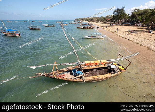 02 August 2021, Tanzania, Fumba: Boats are anchored on the beach in the Indian Ocean. Photo: Sebastian Kahnert/dpa-Zentralbild/dpa
