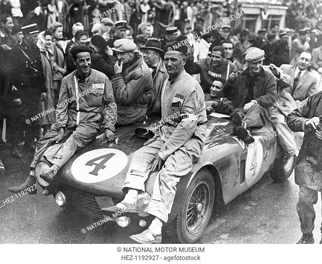 The victorious Ferrari of Jose Froilan Gonzalez and Maurice Trintignant, Le Mans 24 hours, France, 1954. Mechanics ride on the car after the race