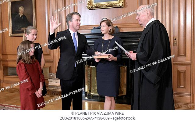 October 6, 2018 - Washington, DC, United States of America - Retired Justice Anthony Kennedy administers the oath of office to Judge Brett Kavanaugh in the...