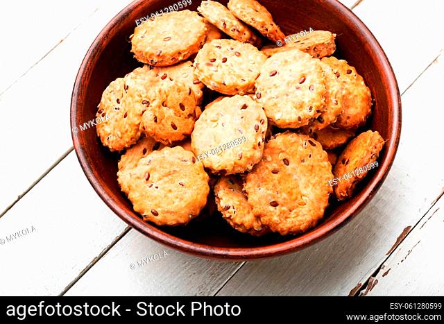 Crackers with ginger and flax. Vegetarian cookies. Copy space