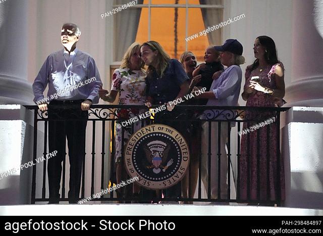 United States President Joe Biden, first lady Dr. Jill Biden and family watch fireworks from the Truman Balcony of the White House in Washington