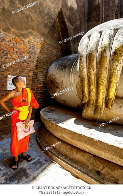 Young Buddhist Monk At Wat Si Chum, Sukhothai, Thailand