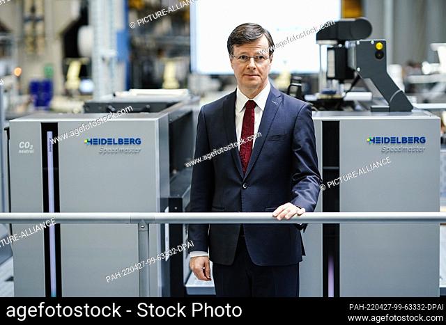 27 April 2022, Baden-Wuerttemberg, Wiesloch: Ludwin Monz, CEO of Heidelberger Druckmaschinen AG, stands at a printing unit in a factory hall at the company's...