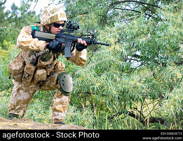 British soldier in camouflage uniform in action