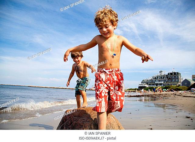 Two boys playing on beach