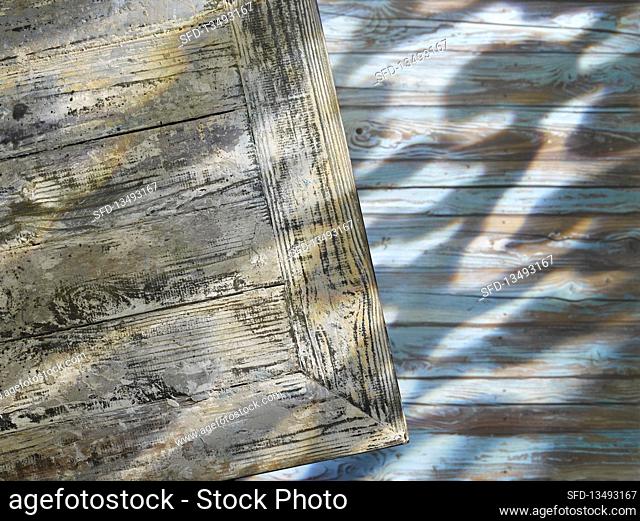 Wooden background with light and shadow