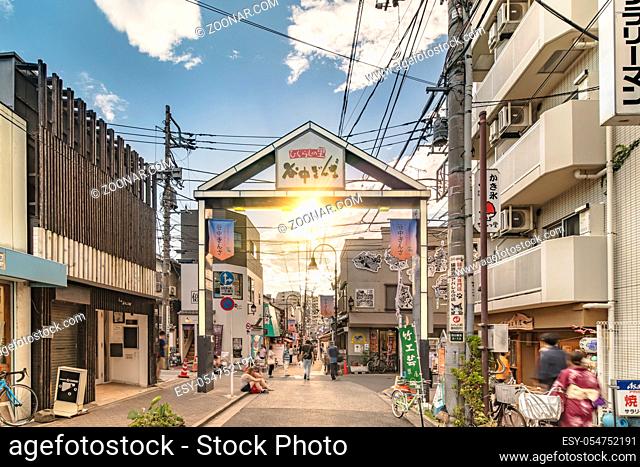 The famous Yuyakedandan stairs which means Dusk Steps at Nishi-Nippori in Tokyo. The landscape overlooking Yanaka Ginza from the top of the stairs is famous as...