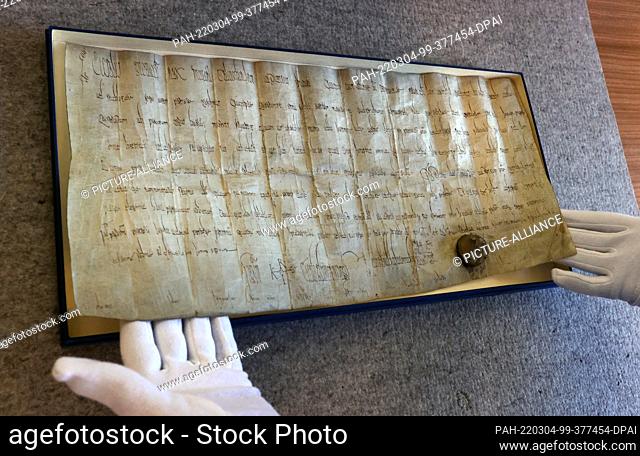 03 March 2022, Bavaria, Würzburg: A document dated January 7, 777 in the Bavarian State Archives. In it, Charlemagne, gives Hammelburg to the monastery of Fulda