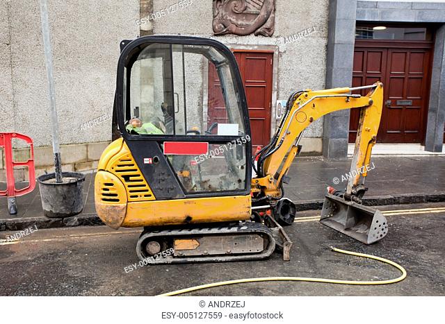 digger on a street