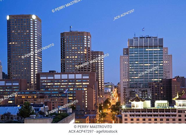 Saint-Urbain street and view of Complexe Desjardins and Hydro-Quebec buildings at dawn, Montreal, Quebec, Canada