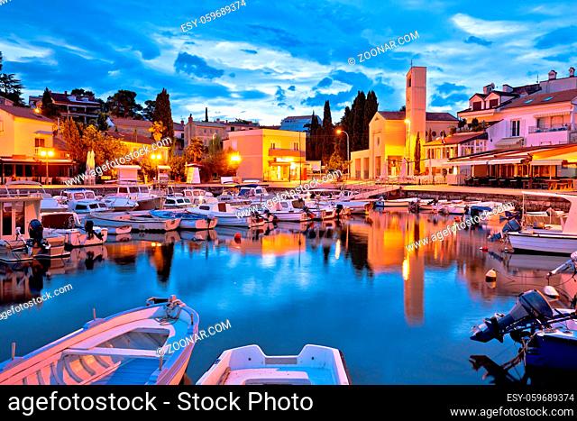 Krk. Town of Malinska waterfront and harbor dawn view, Krk island in Croatia