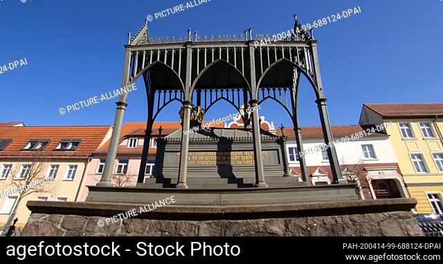 07 April 2020, Brandenburg, Gransee: The monument to St. Luis on Schinkelplatz in the Brandenburg town of Gransee in the Oberhavel district rises into the blue...