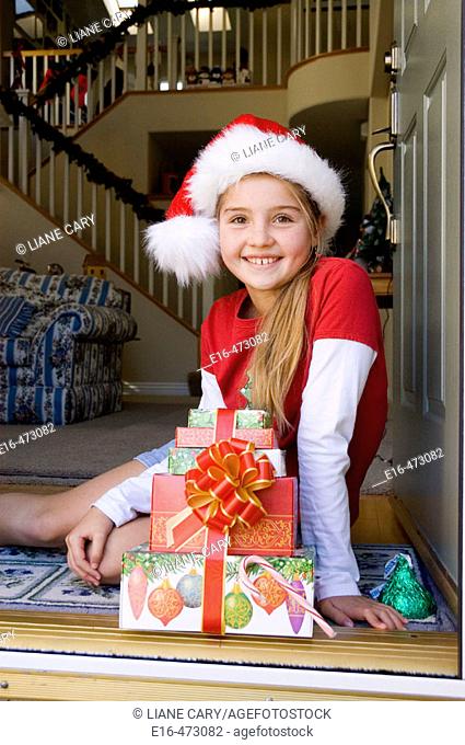 Girl with Christmas presents