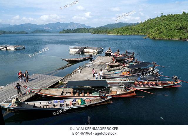 Longtail boats at a jetty near Khao Pang, Khao Sok National Park, man-made reservoir, Chiao Lan Lake, Surat Thani, Thailand, Asia