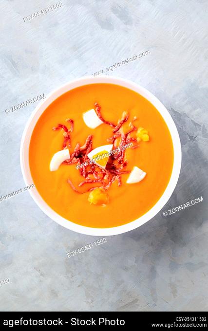 Salmorejo, Spanish cold tomato soup, overhead shot with a place for text