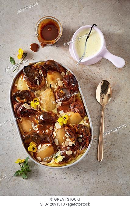 Bread and butter pudding with poached pears and caramel