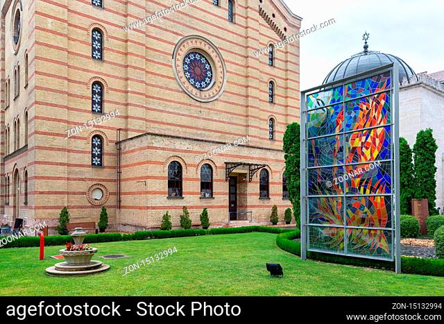 Budapest, Hungary - Juli 12, 2019: Garden with work of art near the Great Synagogue in Budapest, Hungary