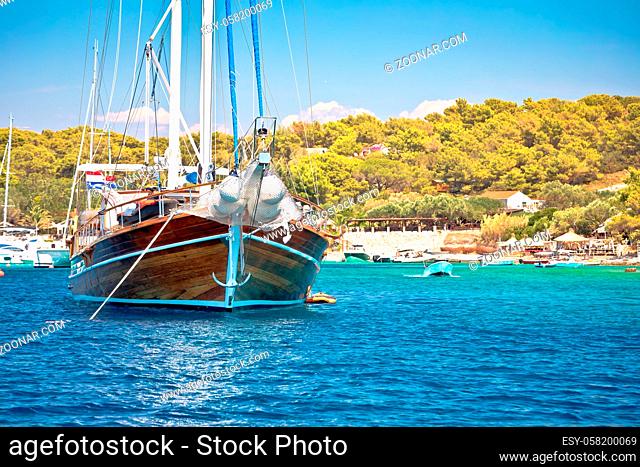 Wooden sailboat in turquoise bay of Hvar archipelago, Palmizana in Pakleni Otoci islands, Croatia