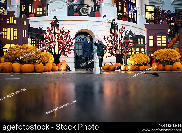 US President Joe Biden and First Lady Jill Biden arrive to greet children dressed up in costumes during a Halloween event on the South Lawn of the White House...