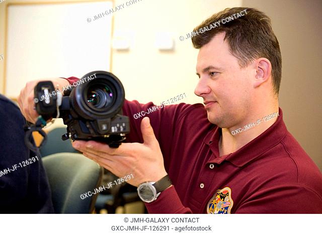 Cosmonaut Roman Romanenko, Expedition 2021 flight engineer, participates in a camera review training session at NASA's Johnson Space Center