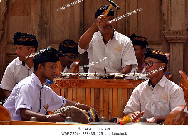 BALI - JULY 28 2019:Balinese gamelan orchestra playing traditional music. Gamelan is the traditional ensemble music of Java and Bali in Indonesia