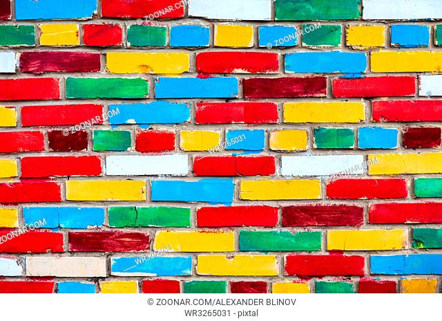 Colorful brick wall from multi colored bricks as a creative background texture