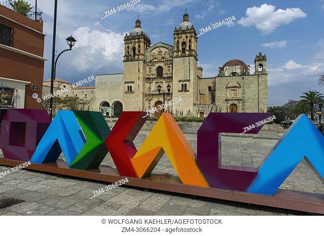Plaza Santo Domingo with colorful letters OAXACA and the Church of Santo Domingo de Guzman in the background in Oaxaca de Juarez, Mexico