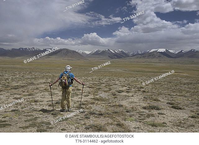 Looking into the Great Pamir Range of Afghanistan while trekking near Lake Zorkul, Tajikistan