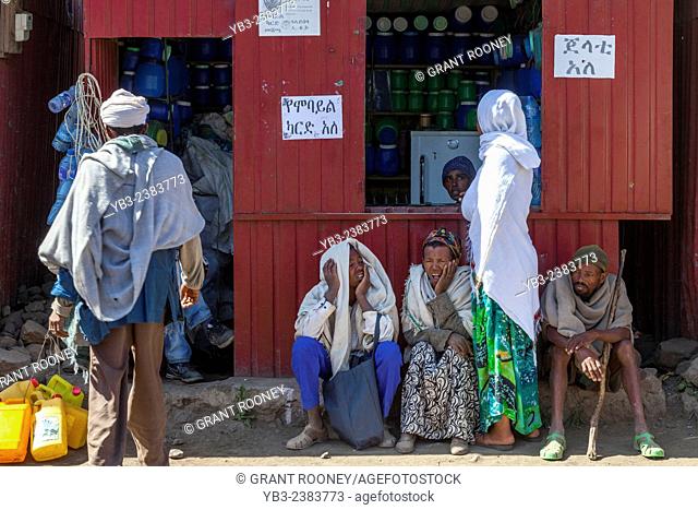 A Group Of Pilgrims Resting Outside A Shop, Lalibela, Ethiopia