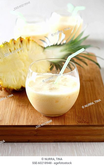 Pineapple, coconut milk, honey and crushed ice cocktail