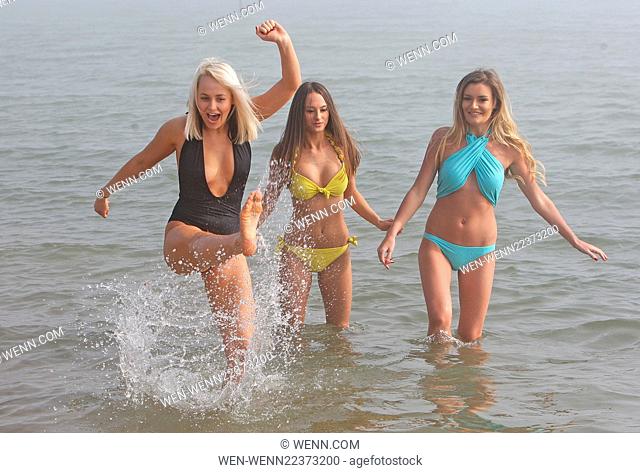 Dancers Elana, Bekka and Eliza enjoying the sunshine at Chalkwell beach in Essex Featuring: Dancers Elana (yellow) Eliza (black) and Bekka (blue) Where: Leigh...
