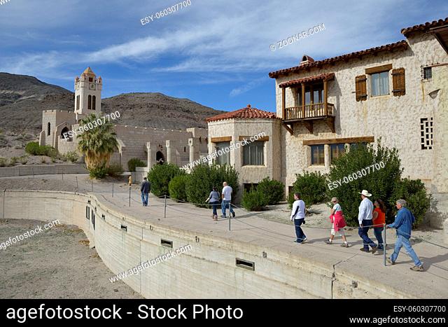 Tour group walking along the unfinished pools, Scotty's Castle, Death Valley, California