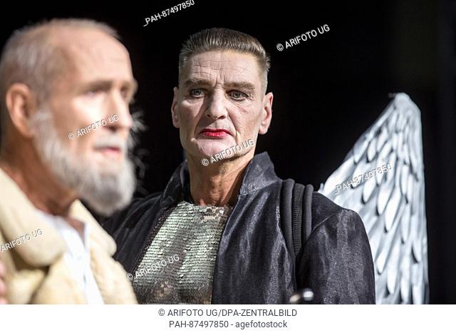 Actors Hans Burkia (Noah) and Johannes Arpe (r, Second Angel) perform during a rehearsal for the Germany premiere of the theatre play 'The Bible' in Rudolstadt