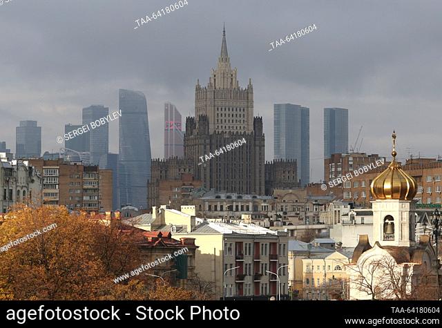RUSSIA, MOSCOW - OCTOBER 31, 2023: The main building of the Russian Foreign Ministry rises over the city, with the Moscow International Business Centre (Moscow...
