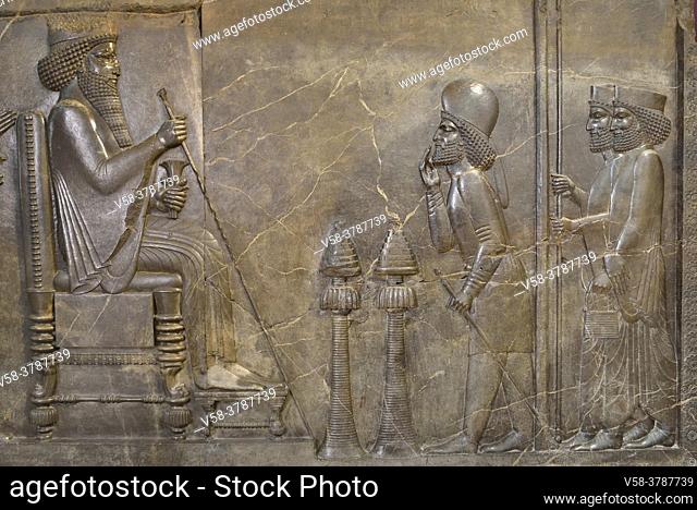 Iran, Tehran, National Museum, Central relief of Apadana northern stairs (Persepolis), Xerxes receiving an important official announcing the arrival of tribute...