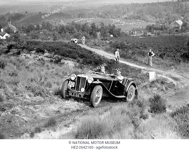 1936 MG TA taking part in the NWLMC Lawrence Cup Trial, 1937. Artist: Bill Brunell