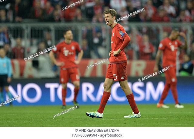 Munich's Thomas Mueller reacts during the Champions League semi-final second leg soccer match between Bayern Munich and Atletico Madrid at the Allianz Arena in...