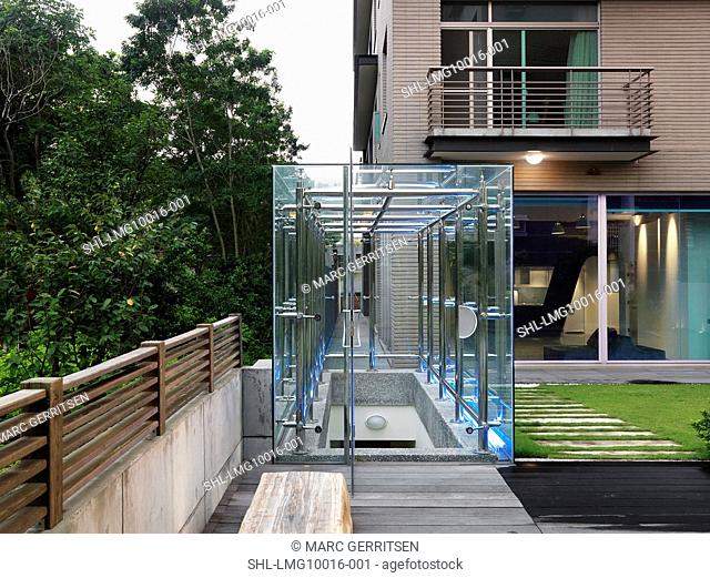 Glass enclosure above staircase